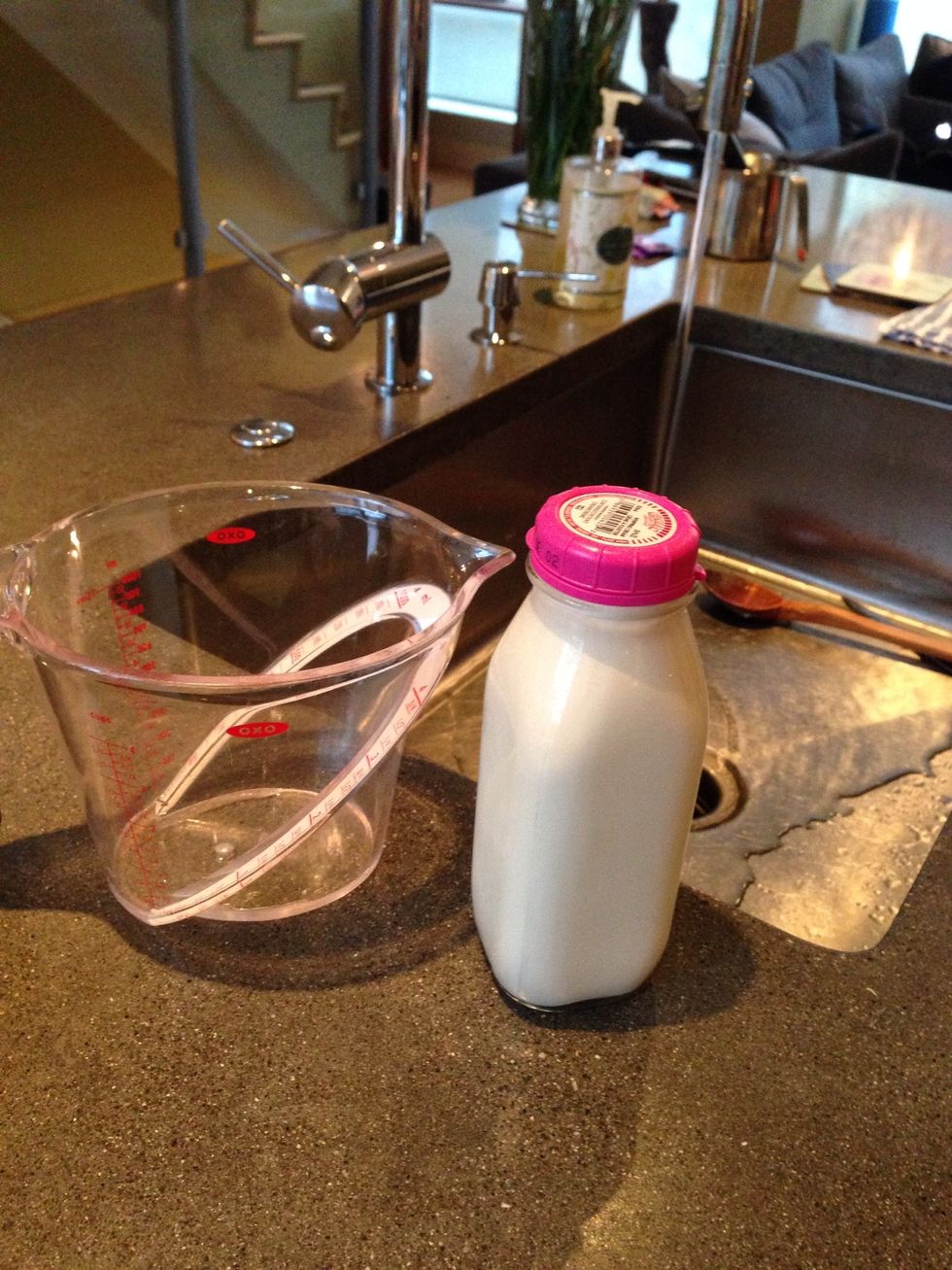 Mix cold water with the whipping cream. And then add them to the spice and tomato paste mixture very slowly while stirring - this will prevent curdling.