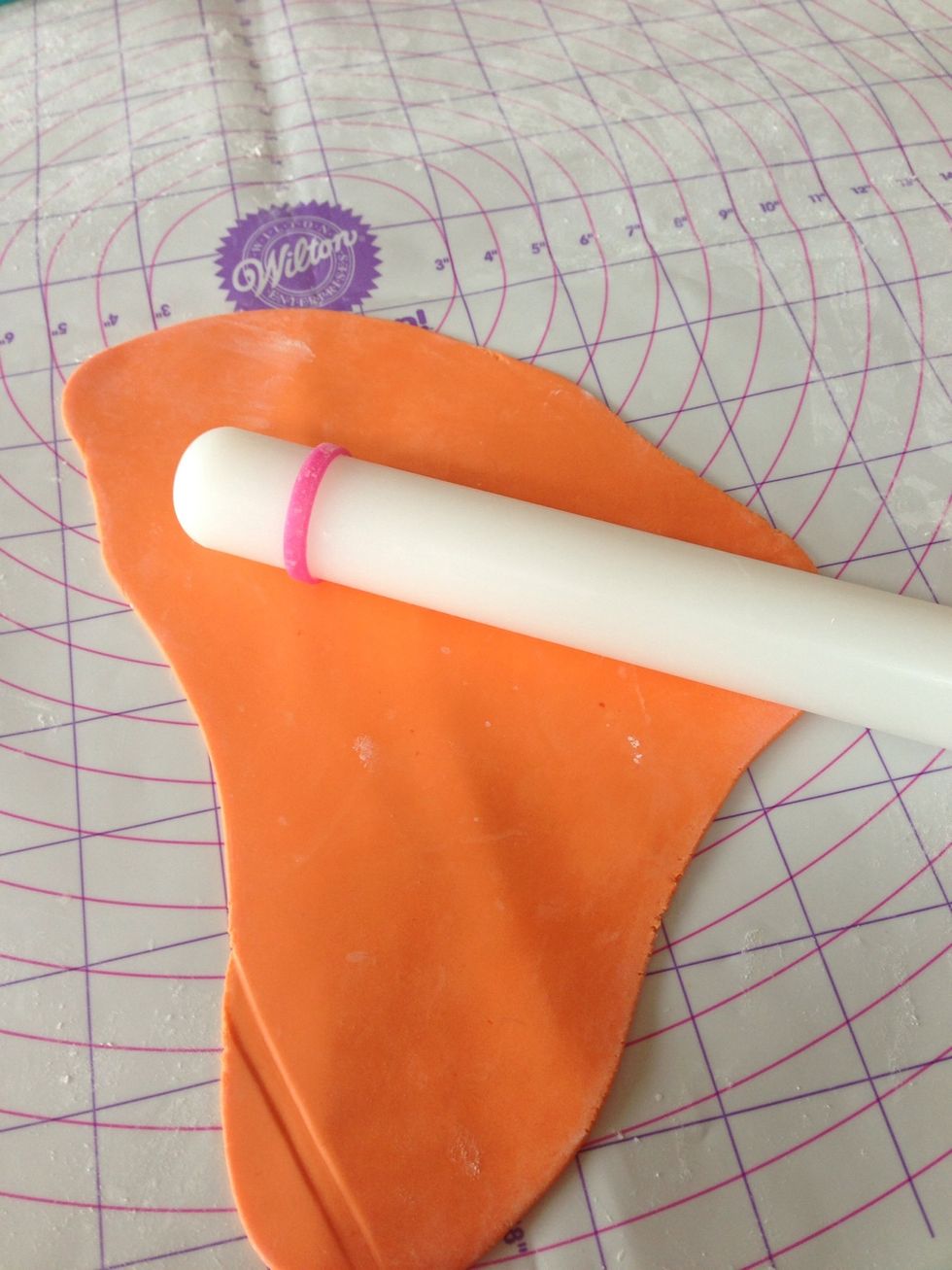 Mix color of your choice, add about equal amount of gum paste to speed the dry time