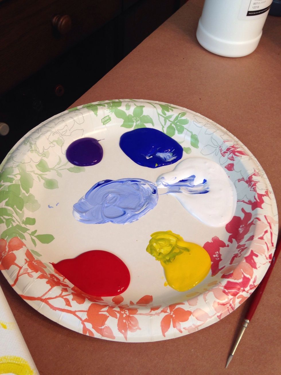 Mix colors to create lighter shades. I wanted my background a sky blue with white swirls so I mixed these two colors then painted them with the flat brush in a swirling motion.
