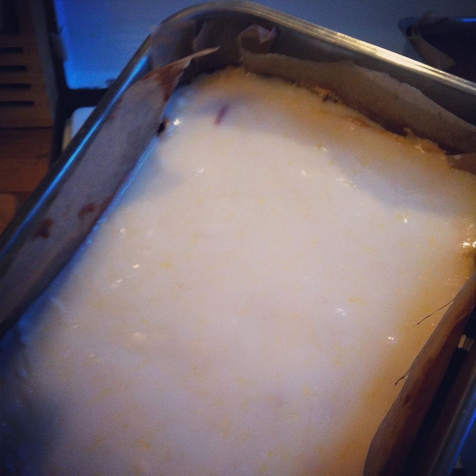 Mix confectioners sugar and rest of the lemon and zest. When cake is cold, spoon glaze over the cake.