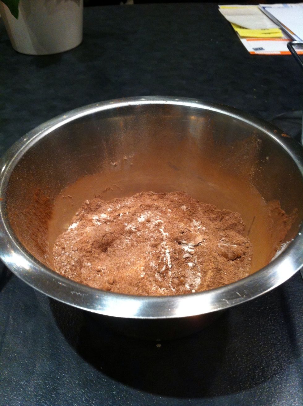 Mix dry ingredients in a bowl - flour, sugar, baking powder and cocoa