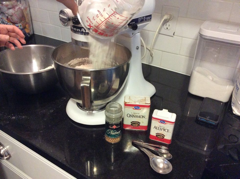 Mix dry ingredients in with wet ingredients slowly and one cup at a time.