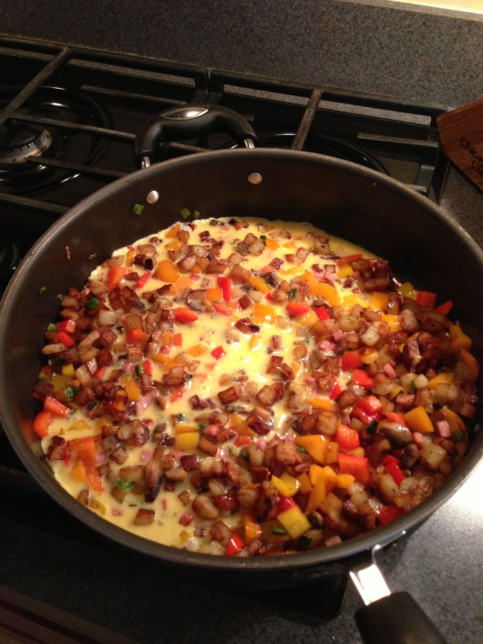 Mix eggs and milk. Pour in and cook till firm