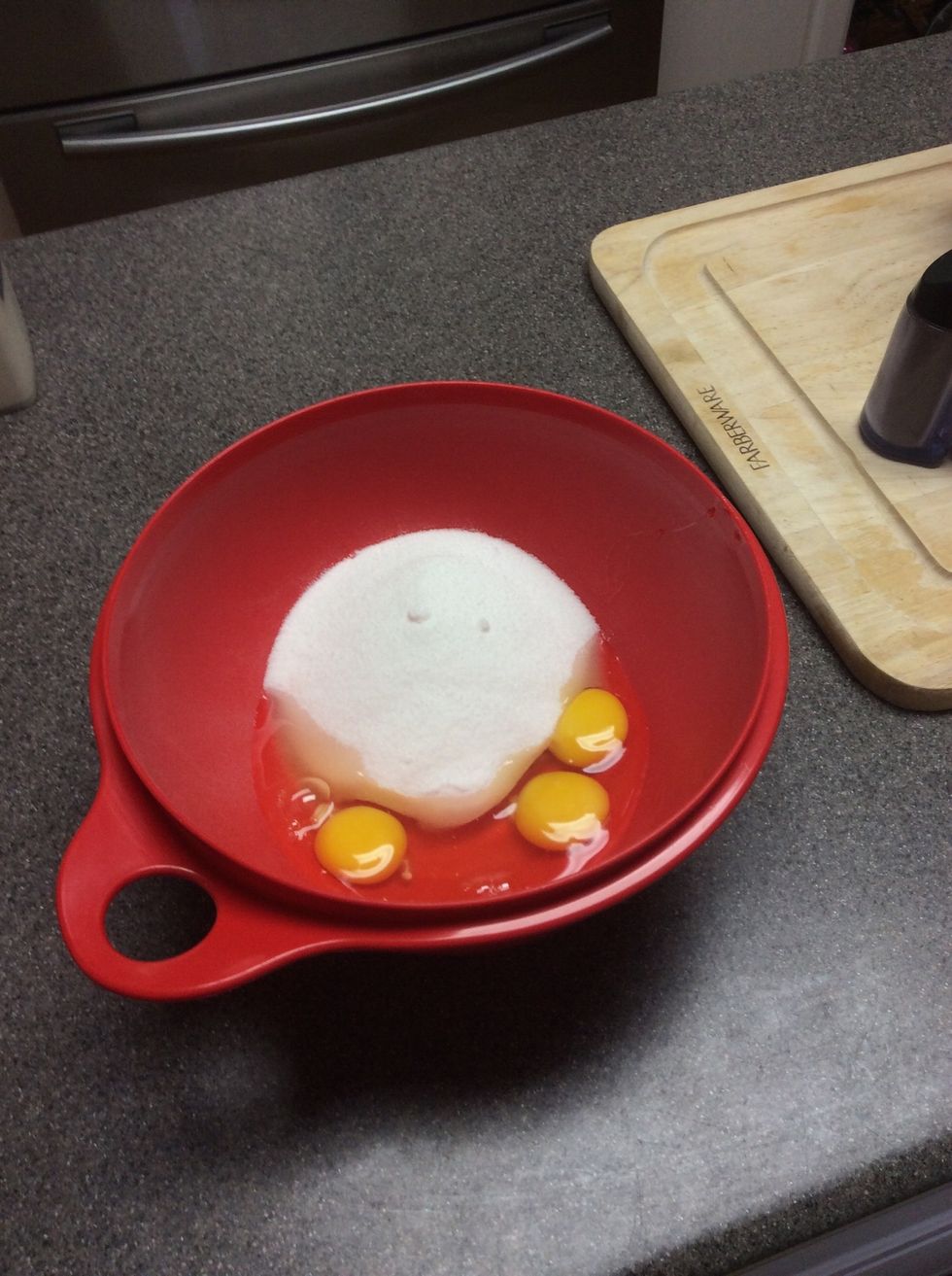 Mix eggs and sugar until blended
