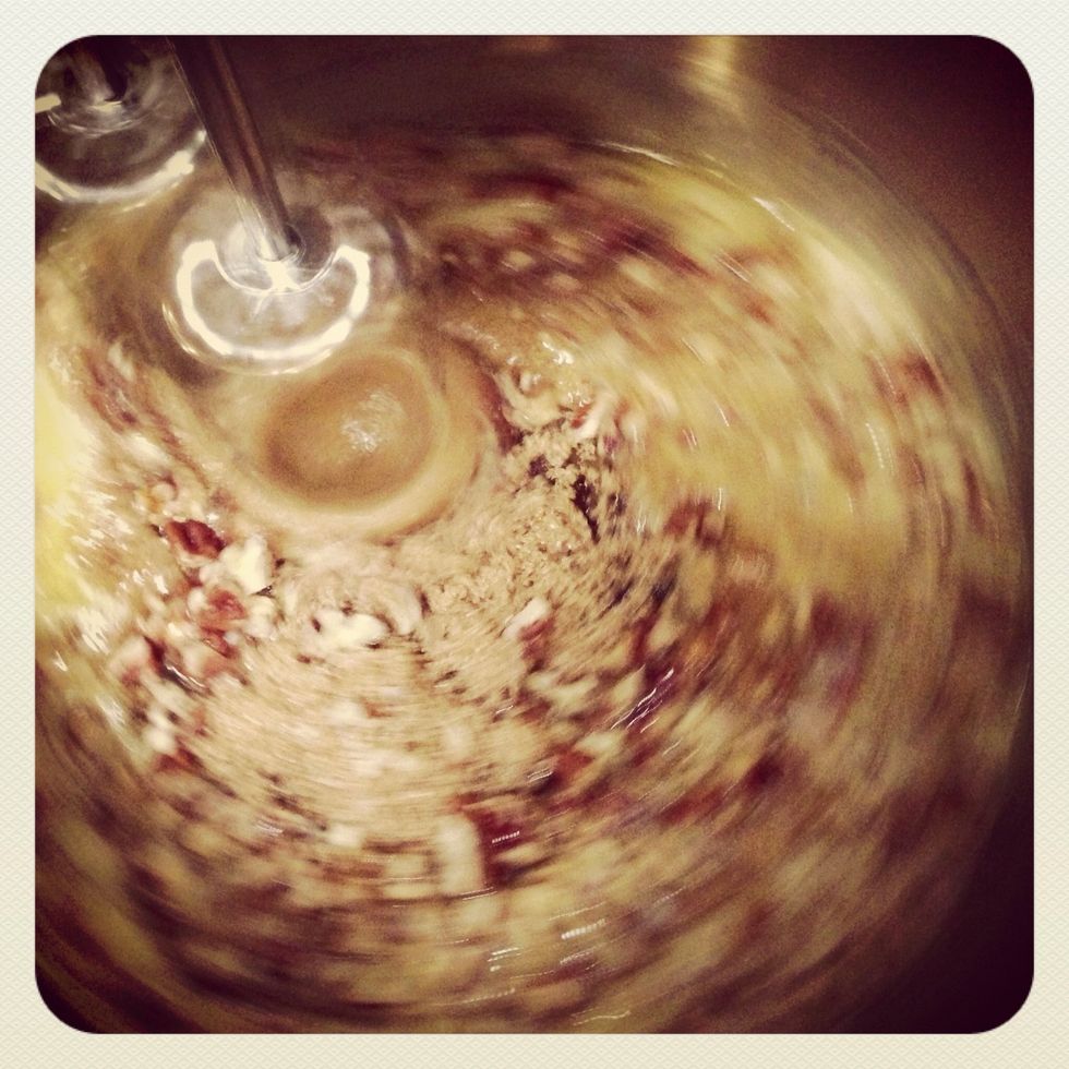 Mix eggs, light and dark corn syrup, brown sugar, butter, salt, and finely crushed pecans.