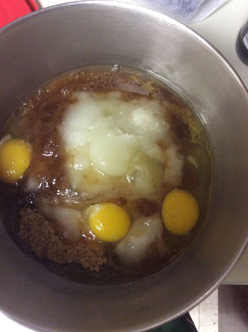 Mix eggs,oil,brown sugar and white sugar together until smooth