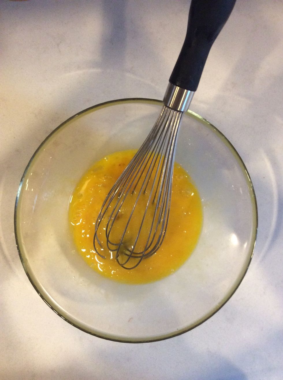 Mix eggs with vanilla.
