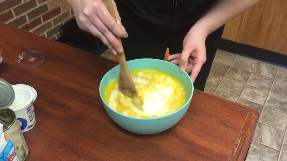 Mix everything together until there are no clumps of cornbread mix.