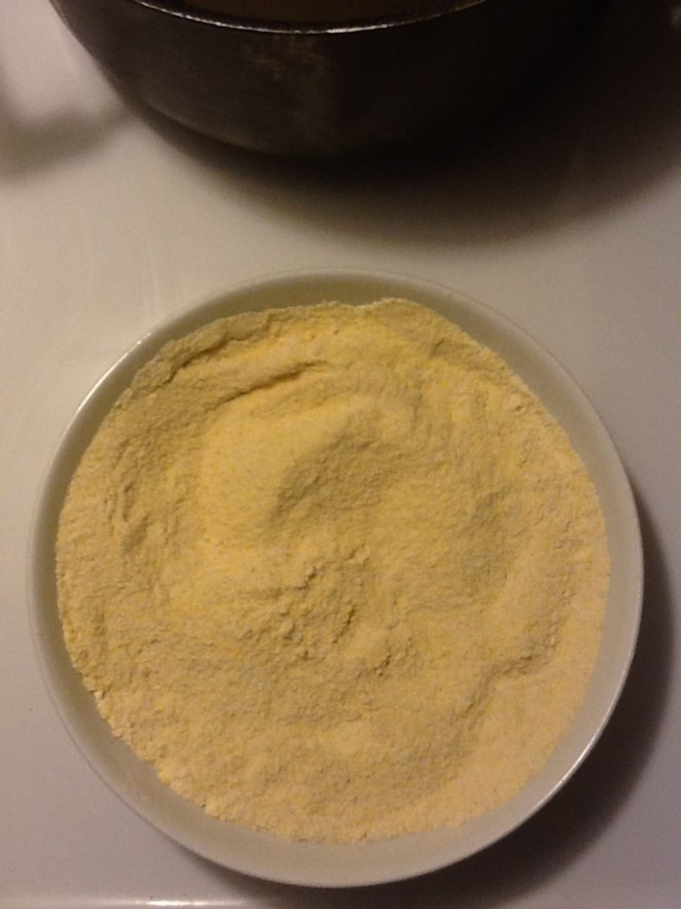 Mix flour and cornmeal