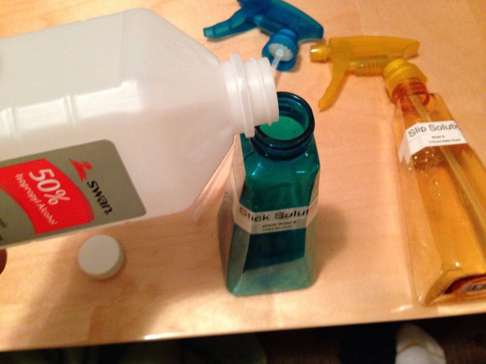 Mix for the stick solution is 1 part alcohol and fill the rest of the bottle with water. Then just shake it up.