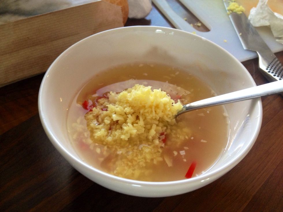 Mix freshly squeezed lime juice with water, fish sauce, ginger, red chili, garlic and sugar.