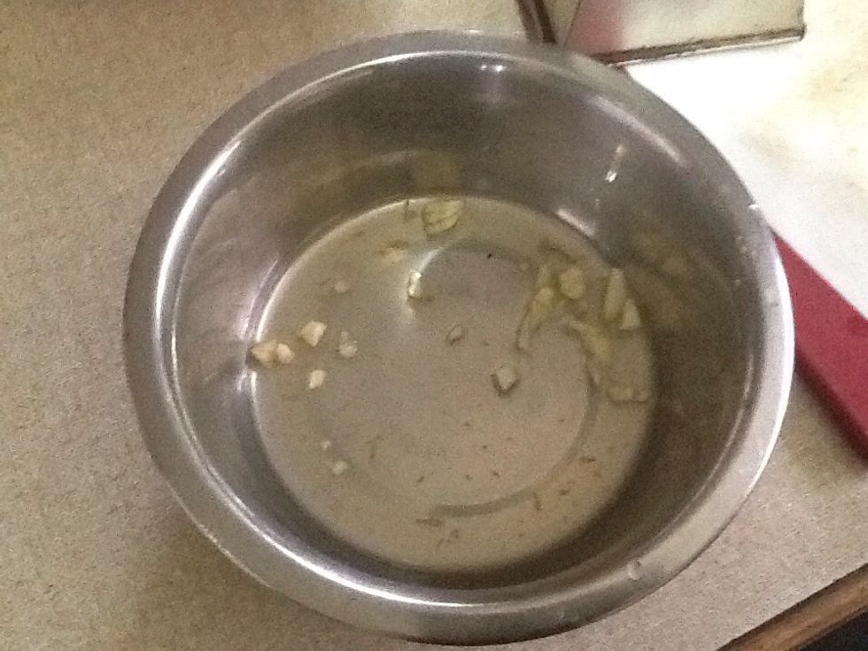 Mix garlic, lemon zest and lemon juice together in a bowl