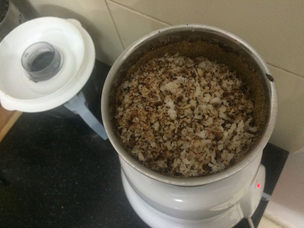 Mix ground spice with roasted coconut and grind again