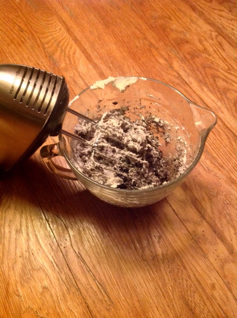 Mix in cream cheese with crushed Oreos until thoroughly mixed.