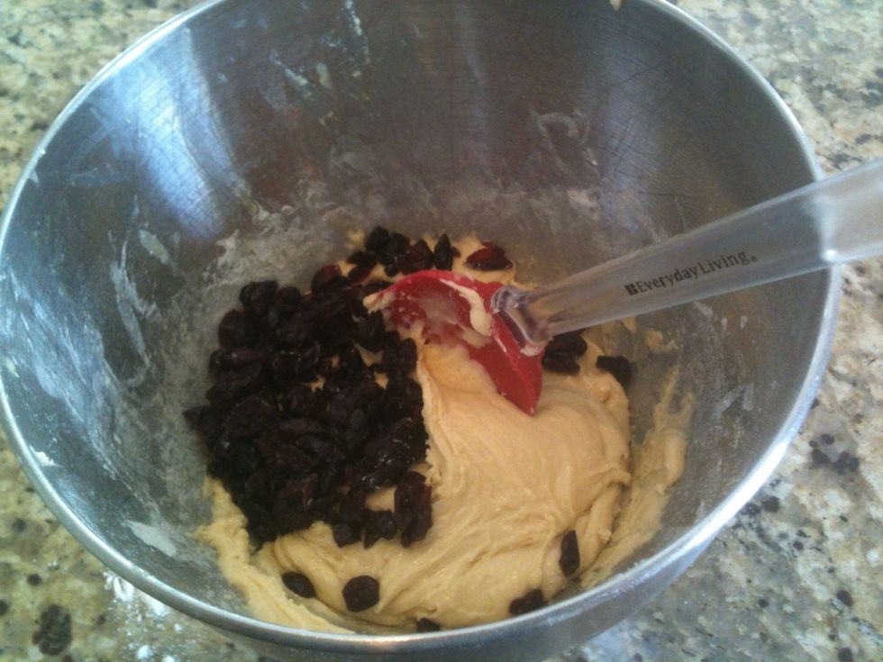 Mix in dried cranberries by hand.