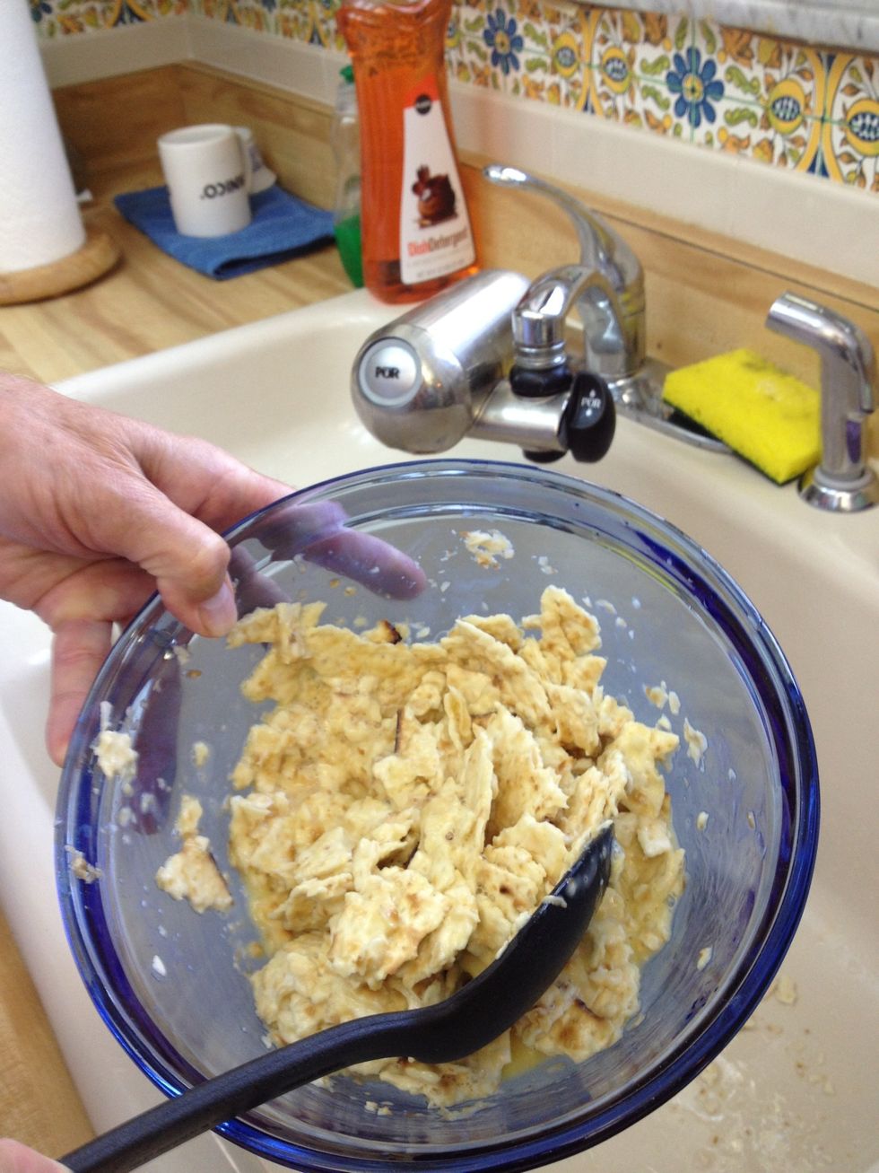 Mix in egg, milk, and matzah until the matzah is covered.