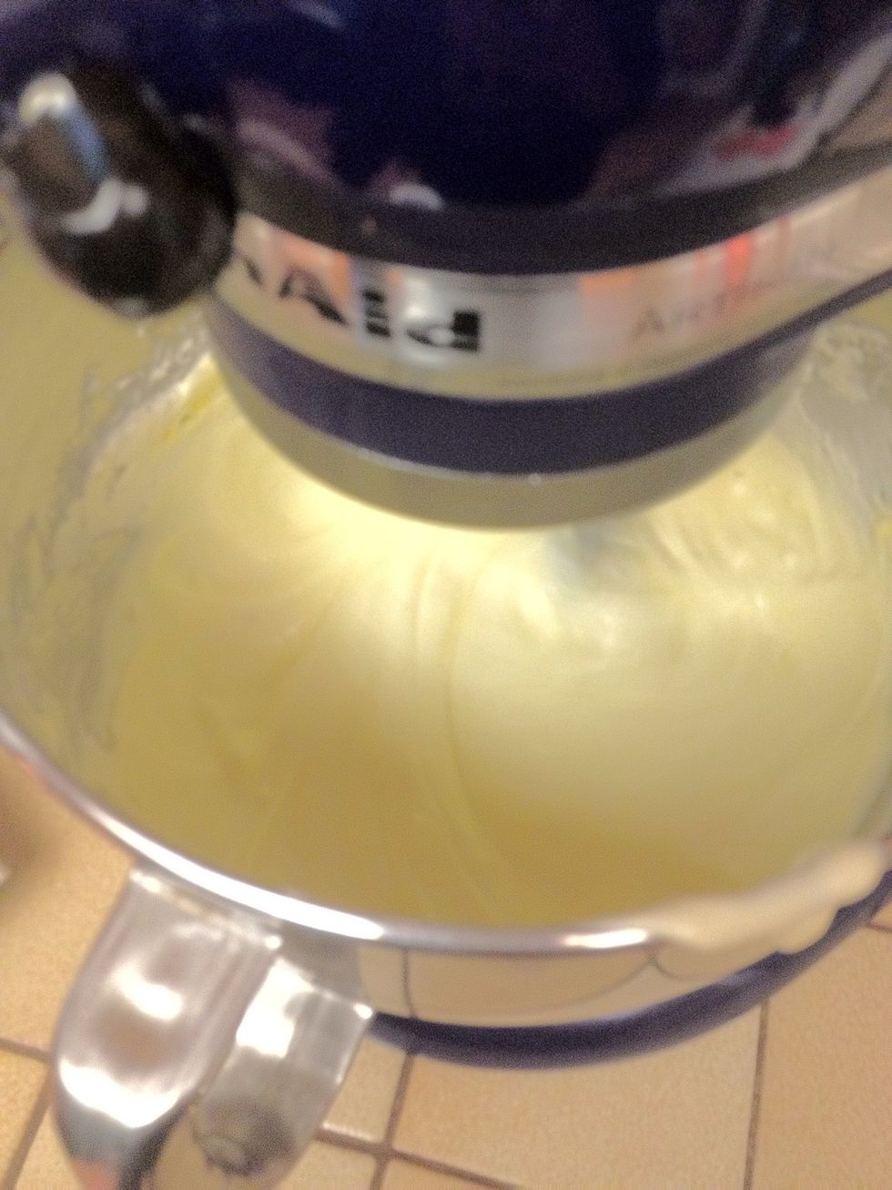 Mix in eggs one at a time. Then add in the vanilla and melted white chocolate. Beware.. This is the temping finger licking step!