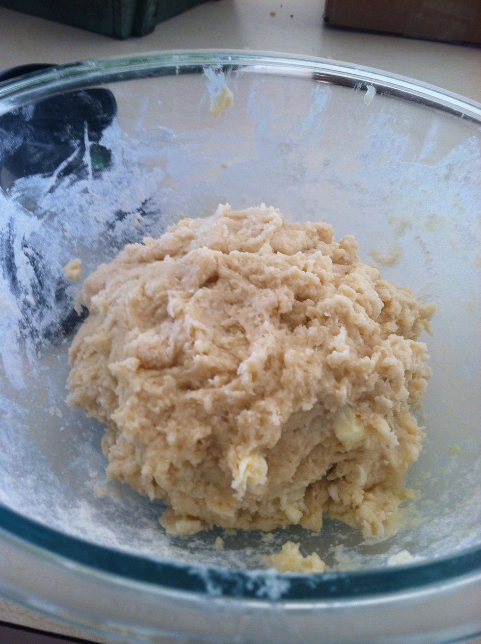 Mix in half melted butter, milk and egg