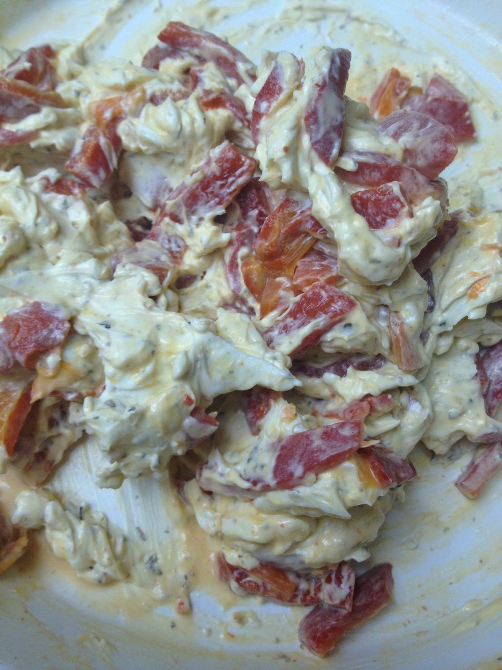 Mix in red peppers.