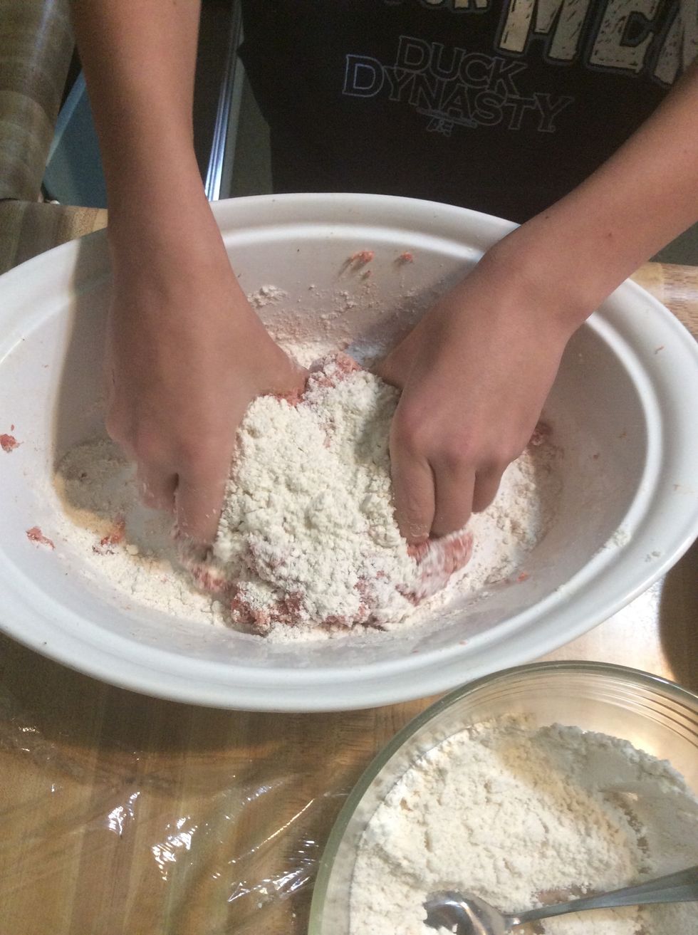 Mix in some of the biscuit mix and cheese.