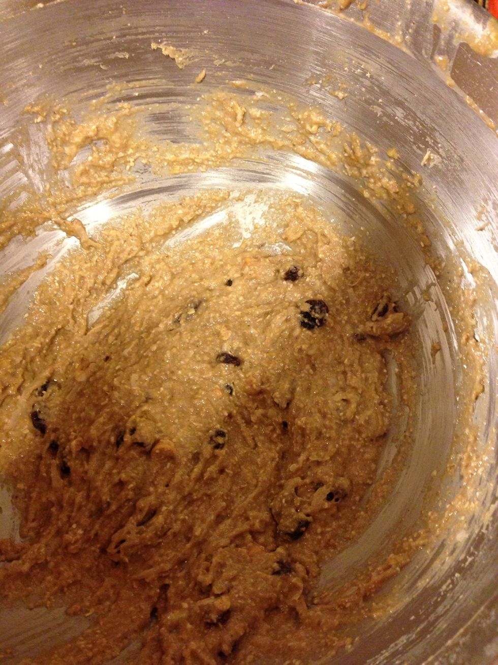 Mix in sugar, vanilla, agave, oat flour baking soda, baking powder, and salt. Add in coconut, raisins and peanut butter chips.