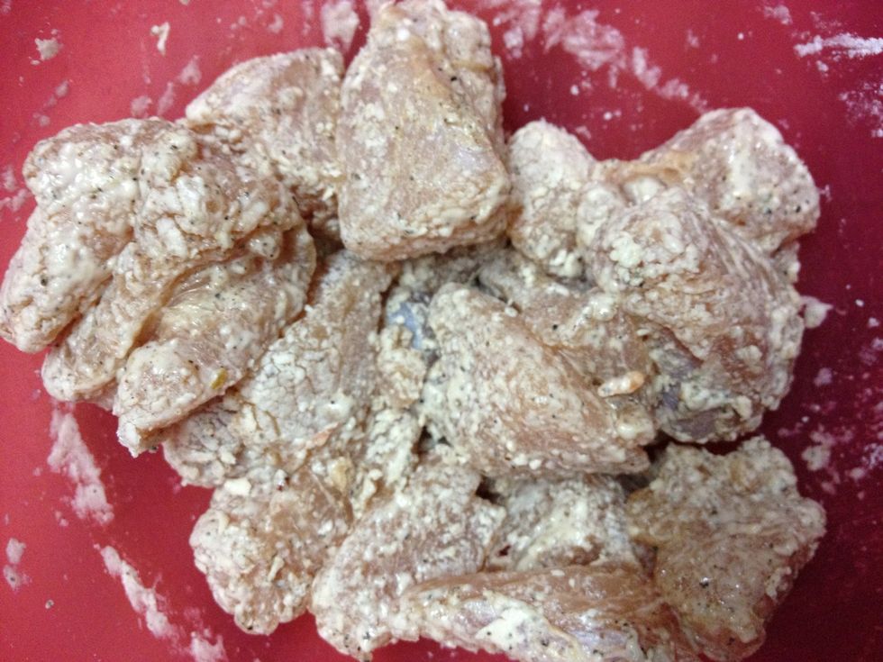 Mix in the corn flour to coat all sides