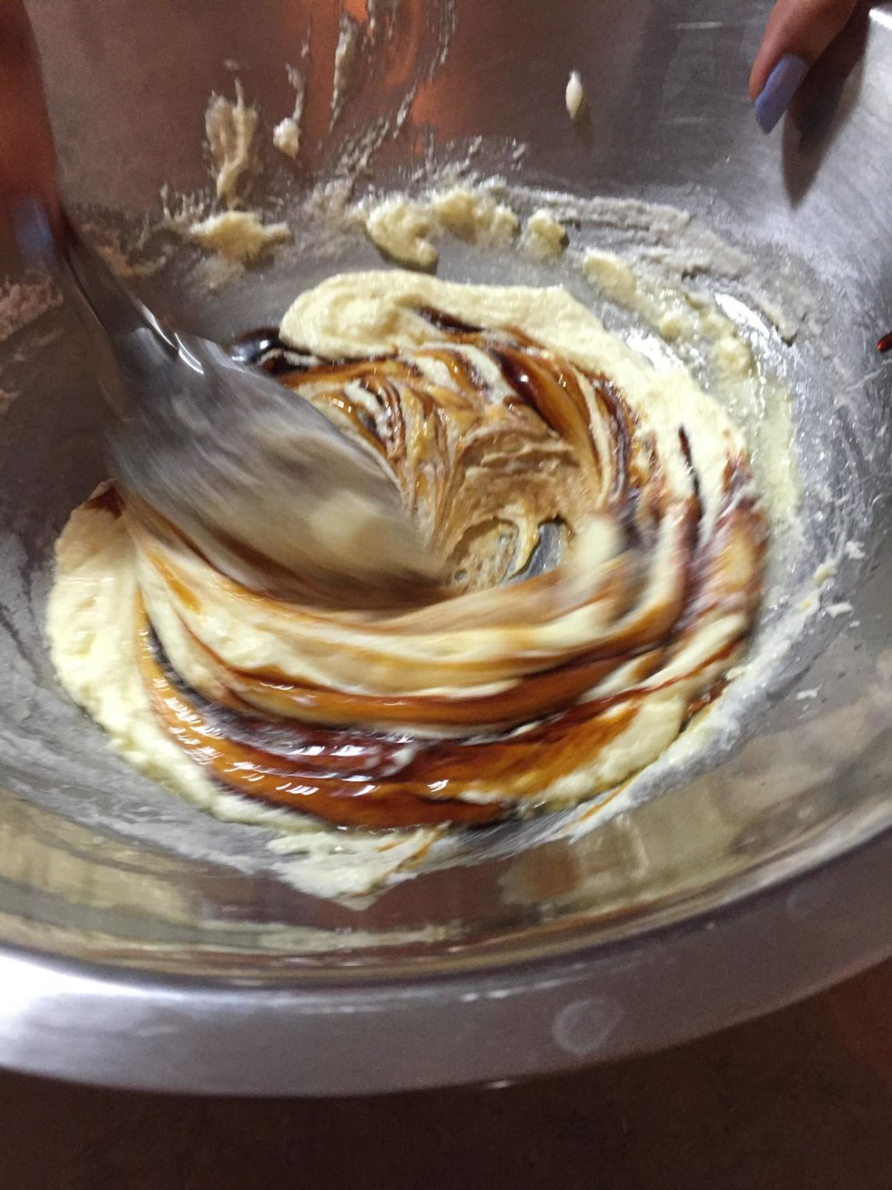 Mix in the egg, water and molases.