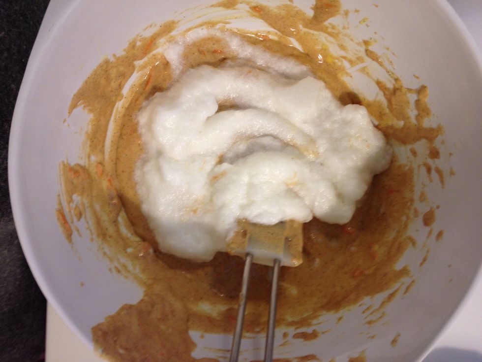Mix in the egg whites a little at a time..