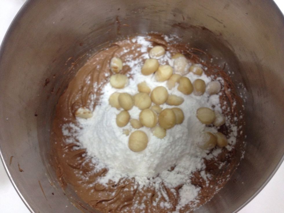 Mix in the flour, baking powder and macadamia.