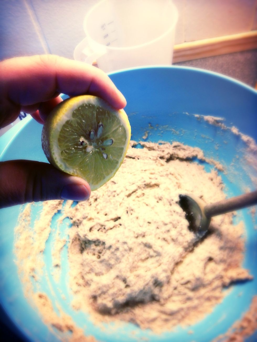 Mix in the lemon, together with the alkaline soda it helps the bread to rice