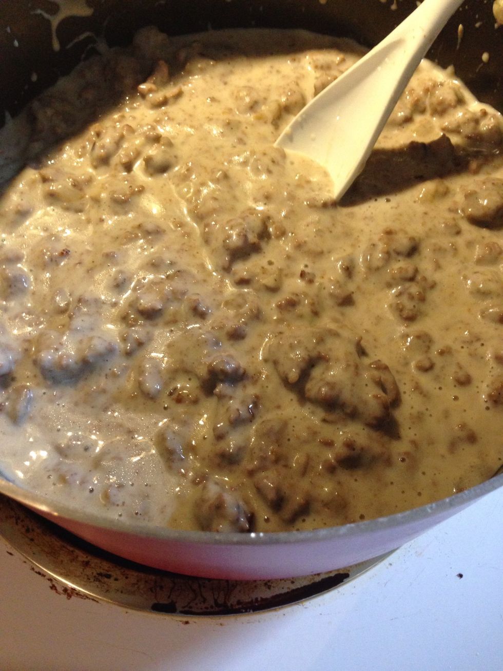 Mix in the mushroom soup and a can of whole milk or 1/2 and 1/2... 1/2 and 1/2 tends to make it creamier but whole milk will work too...