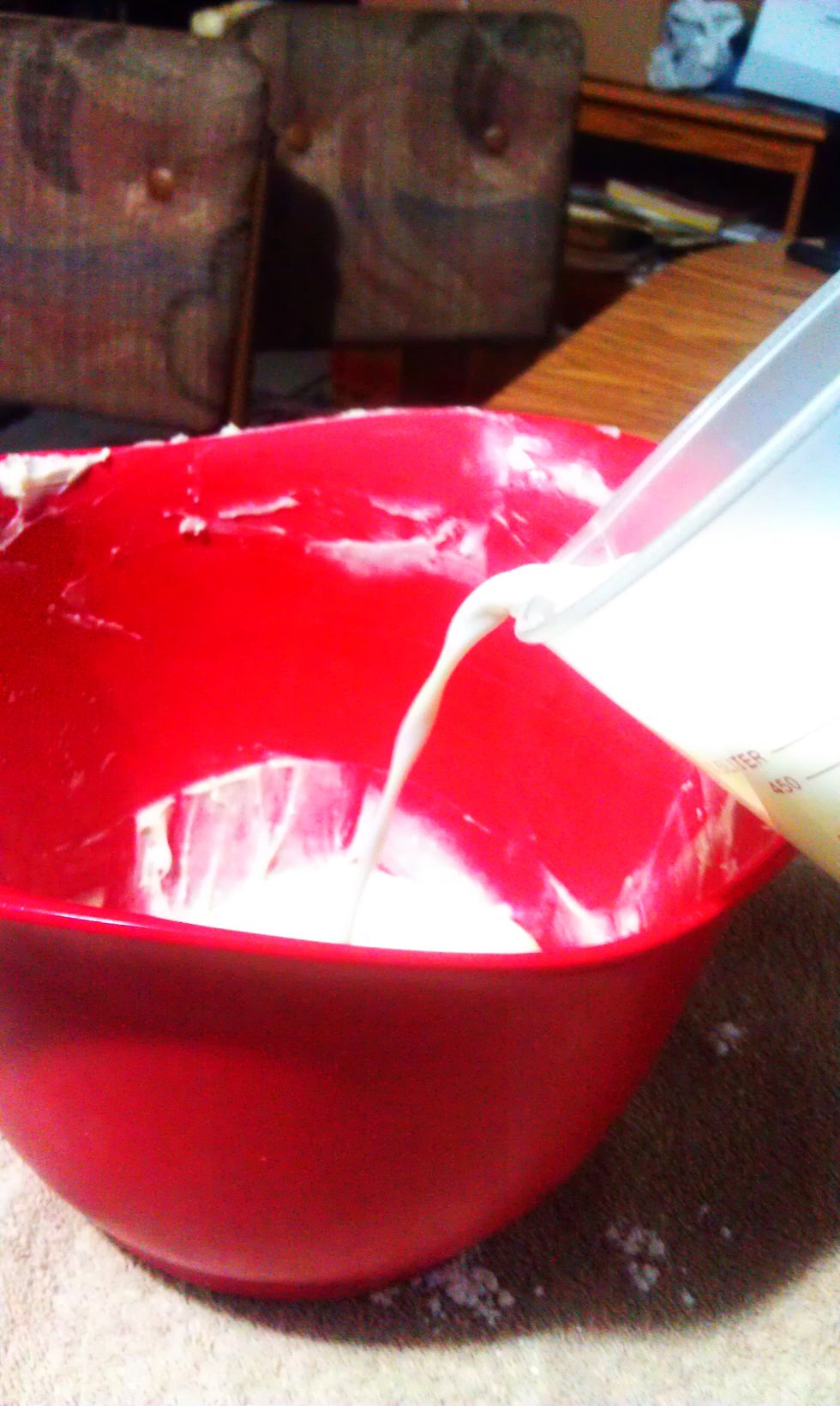 Mix in the peanut butter and the milk with the whisk. Beat until smooth.