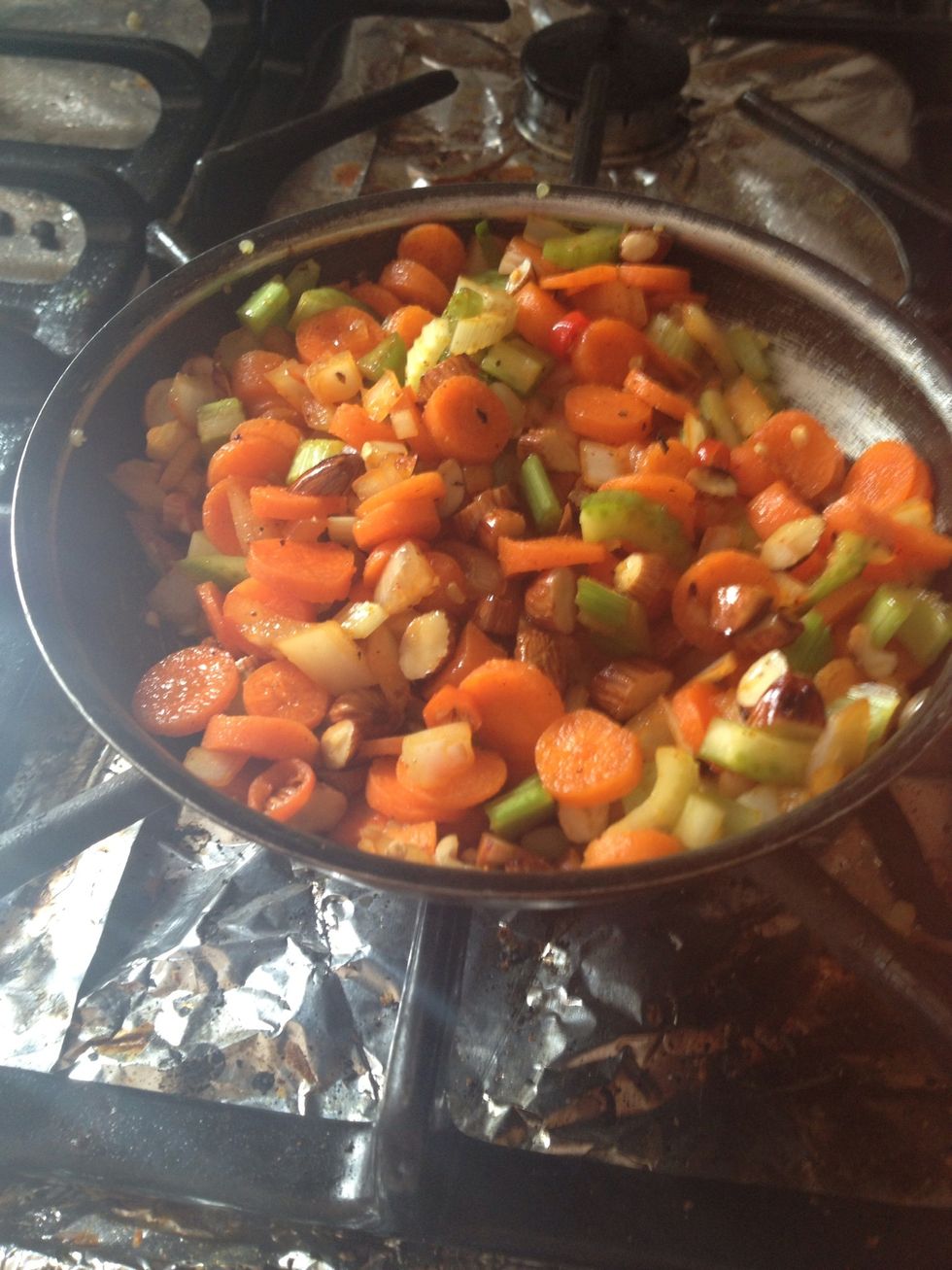 Mix in veggies with almonds