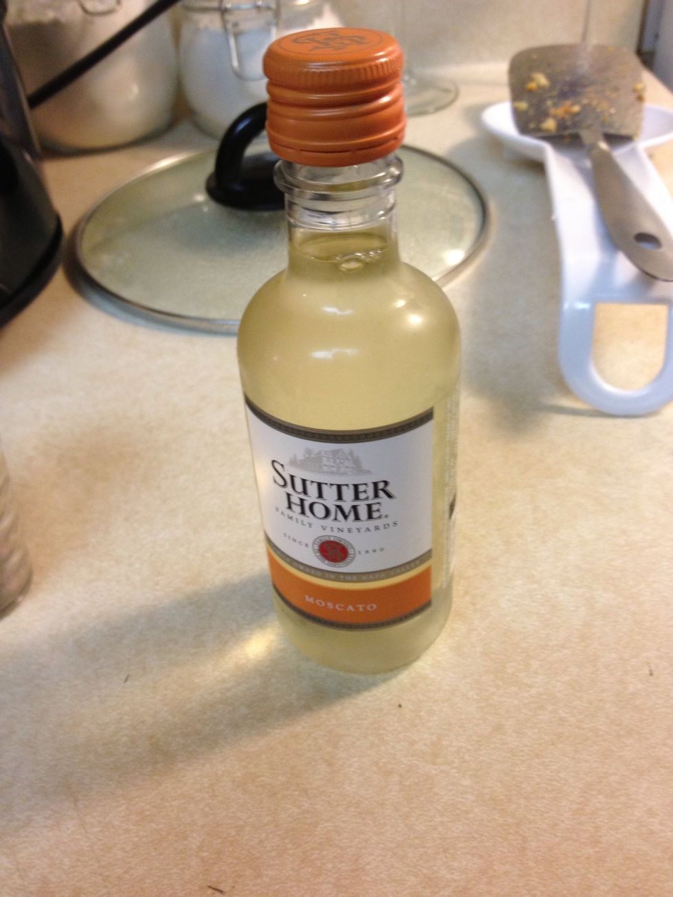 Mix in your favorite wine to taste. We used half of this mini Sutter Home Moscato bottle.