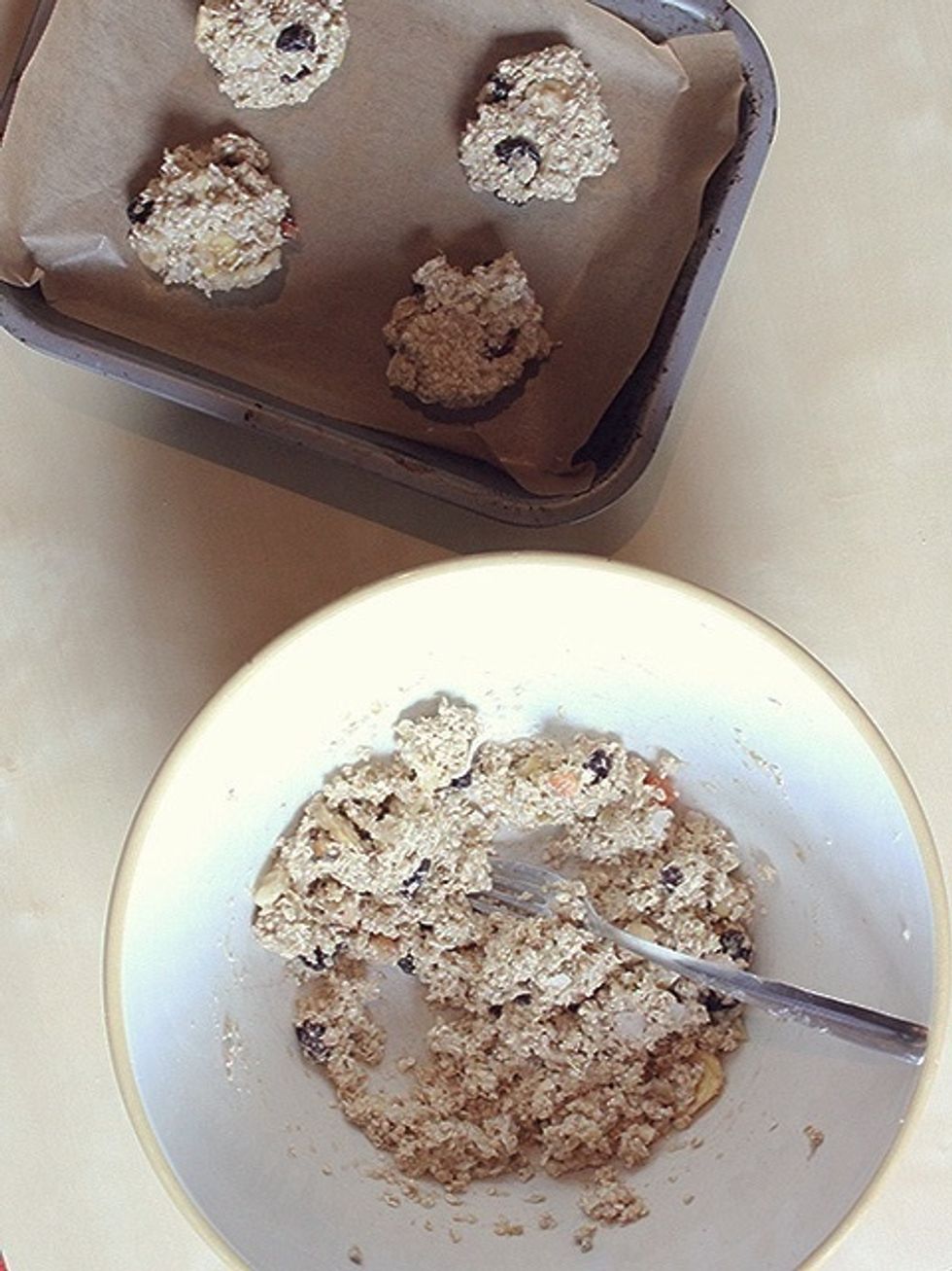 Mix in your trail mix or other dried fruit of choice and use your hands to mould the mixture into cookie sized pieces.