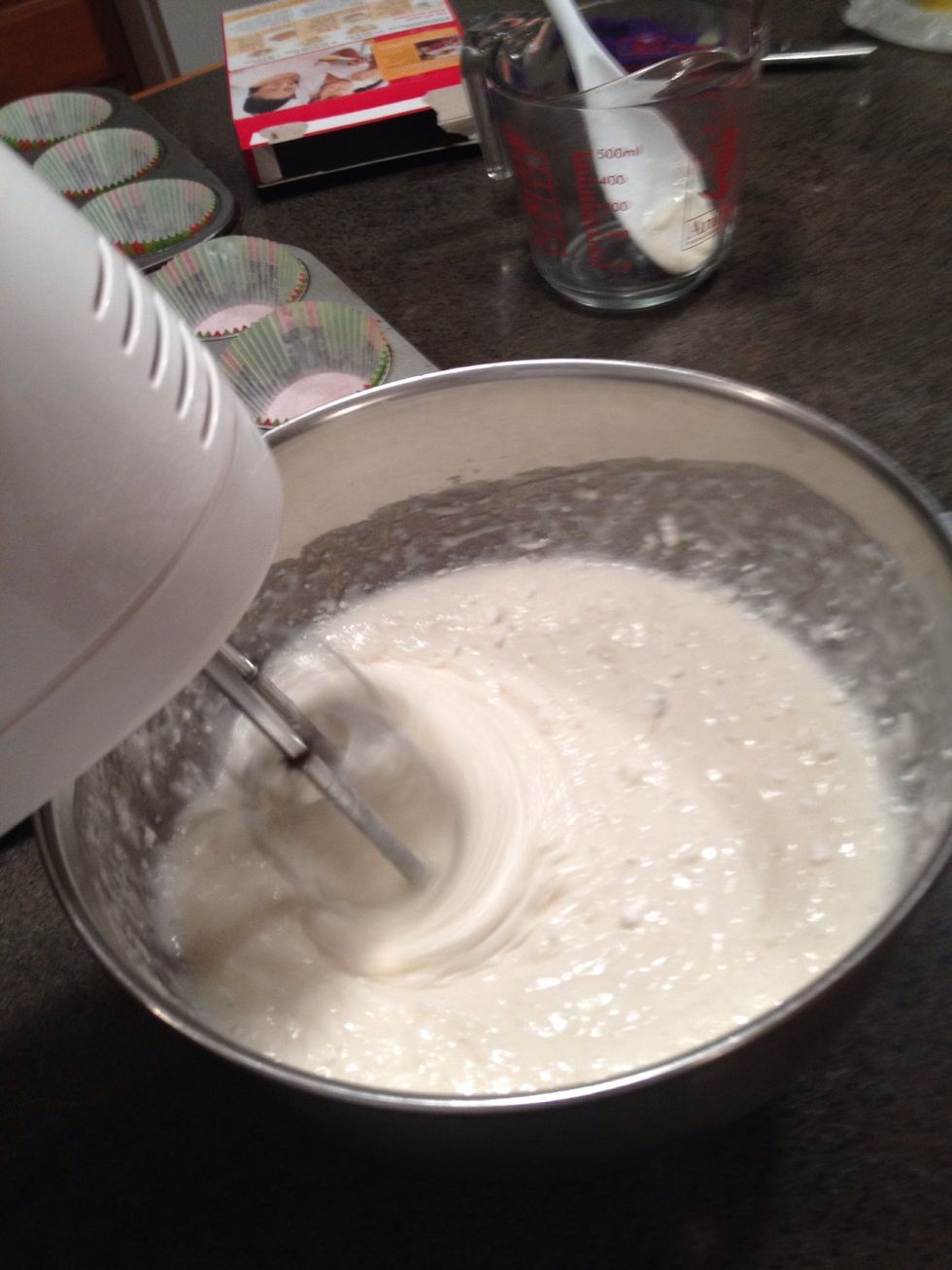 Mix ingredients on low a speed. Spilt your batter into two even bowls. You will put red food coloring in only ONE bowl.