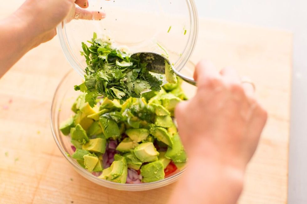 Mix ingredients together. Then, add mixture to the larger bowl and mix.