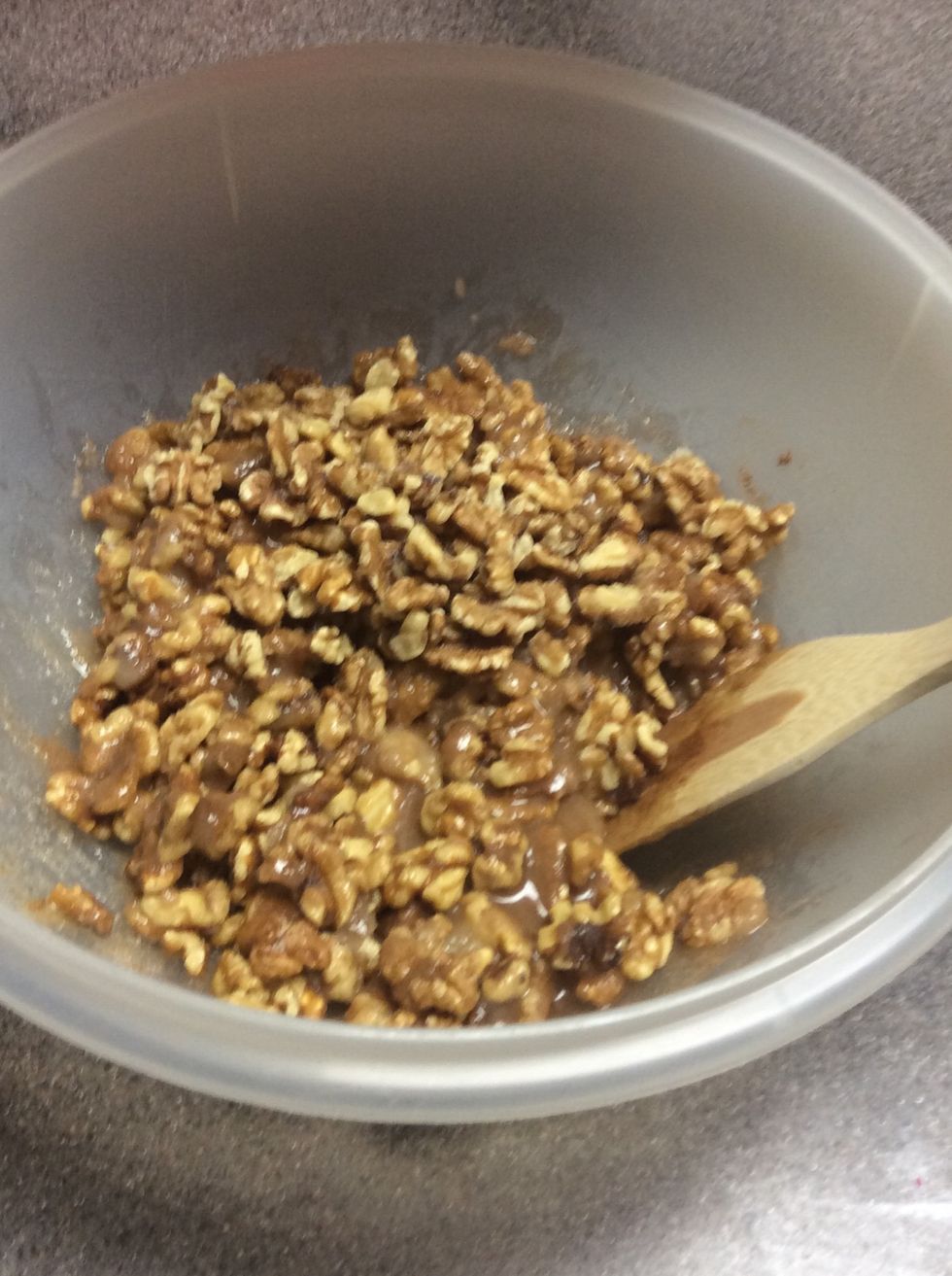 Mix ingredients until the walnuts are covered in the mixture