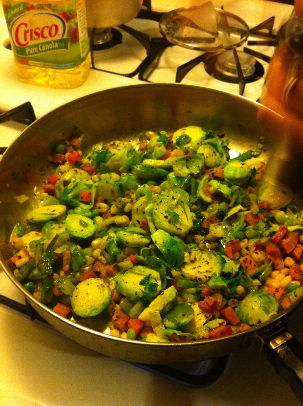 mix it all up and add the oyster sauce. let it sit for 3 or 4 minutes. we're making sure the Brussels sprouts are cooked before adding the rice.