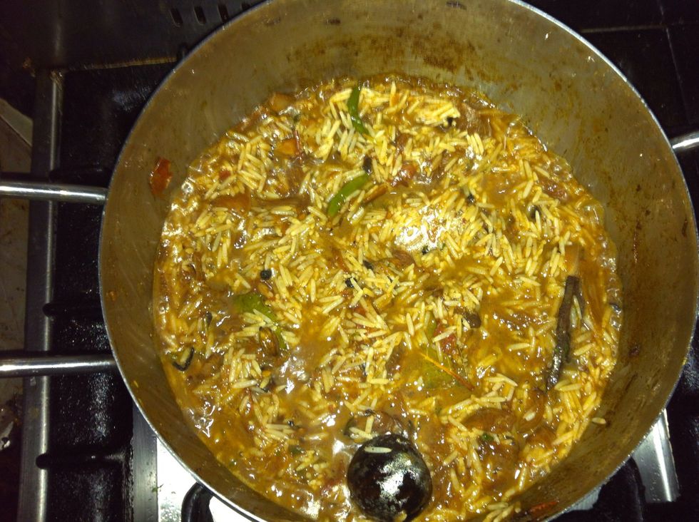 Mix it in over high heat untill the liquid is absorbed