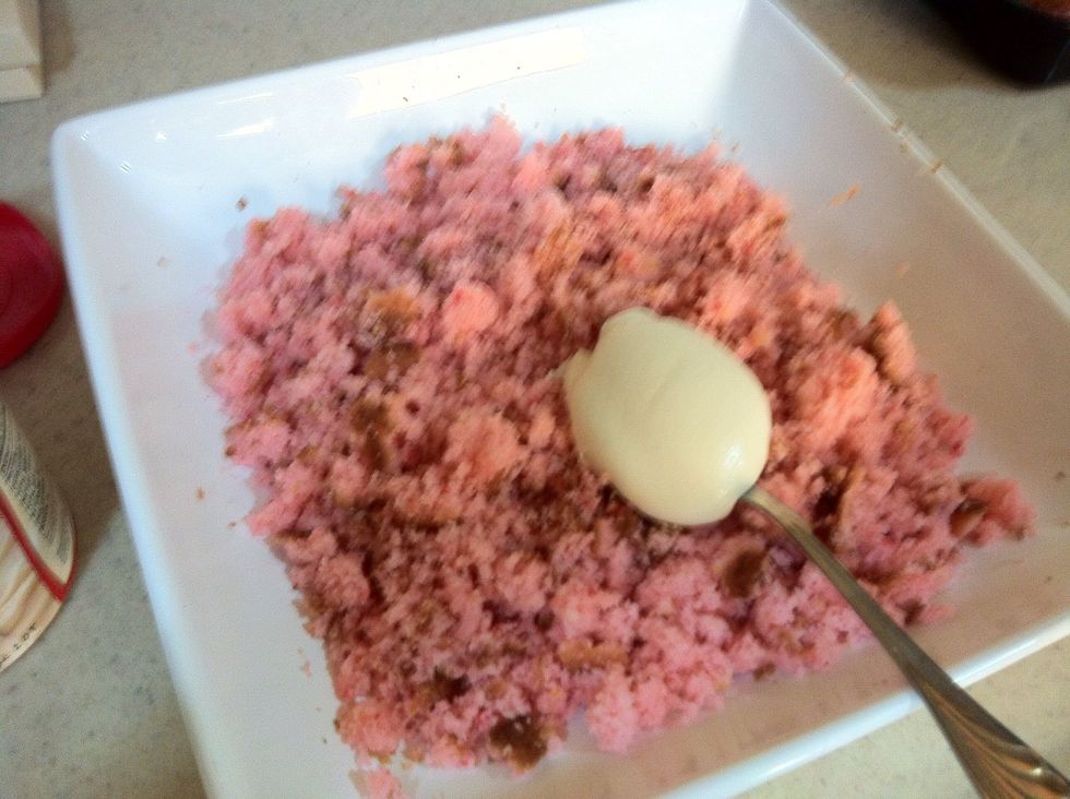 Mix it well with the cake either by spoon or by your hand