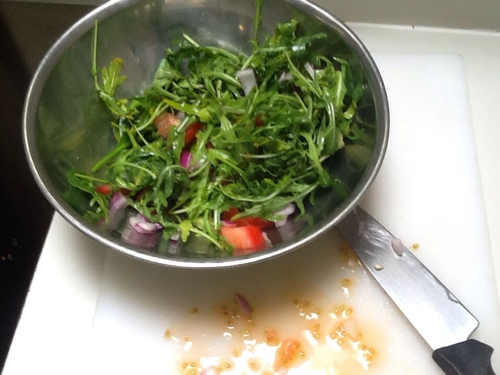 Mix lettuce with tomato and onions to make salad as a side dish