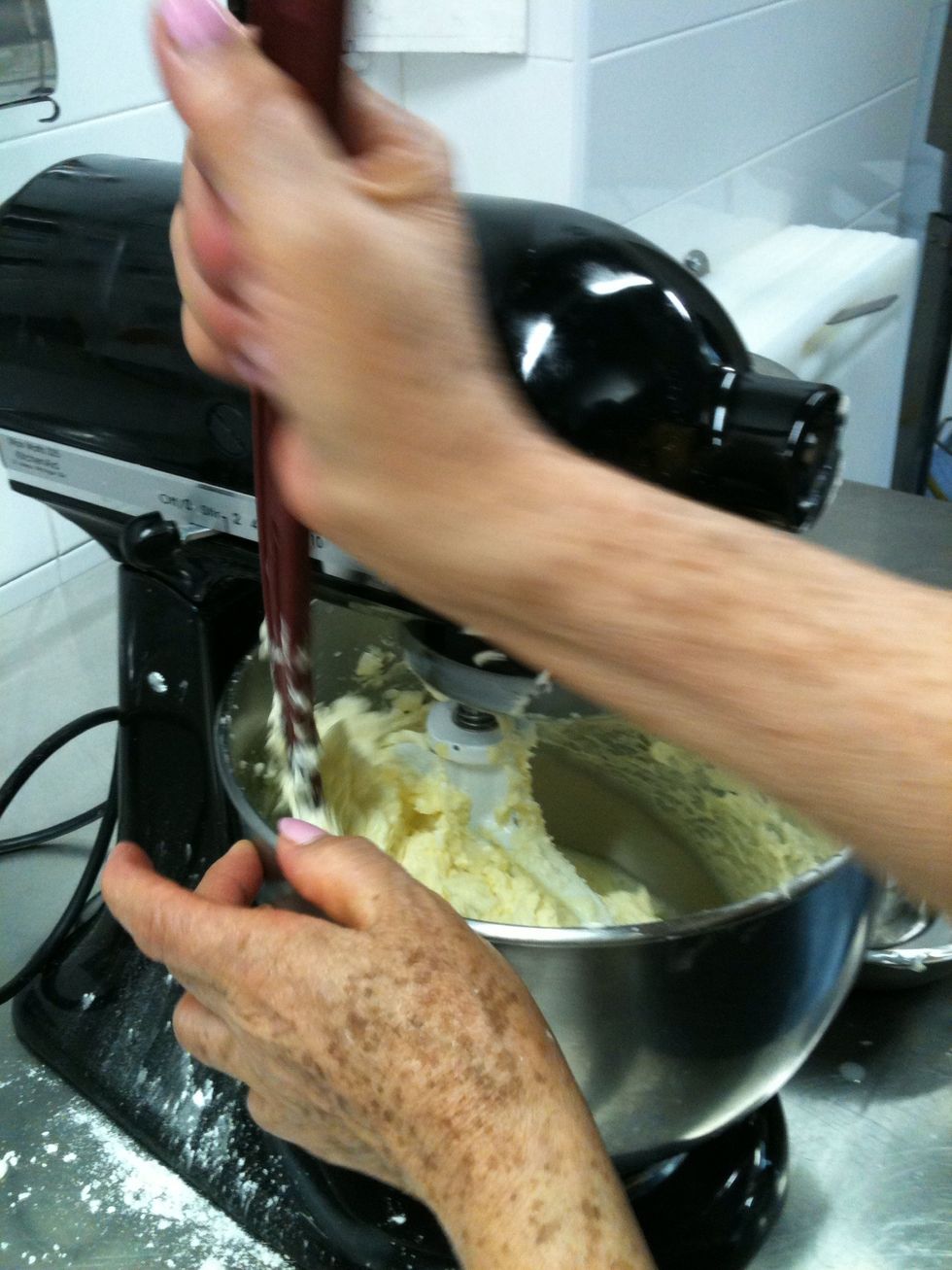 Mix margarine and sugar in a blender for 15 minutes