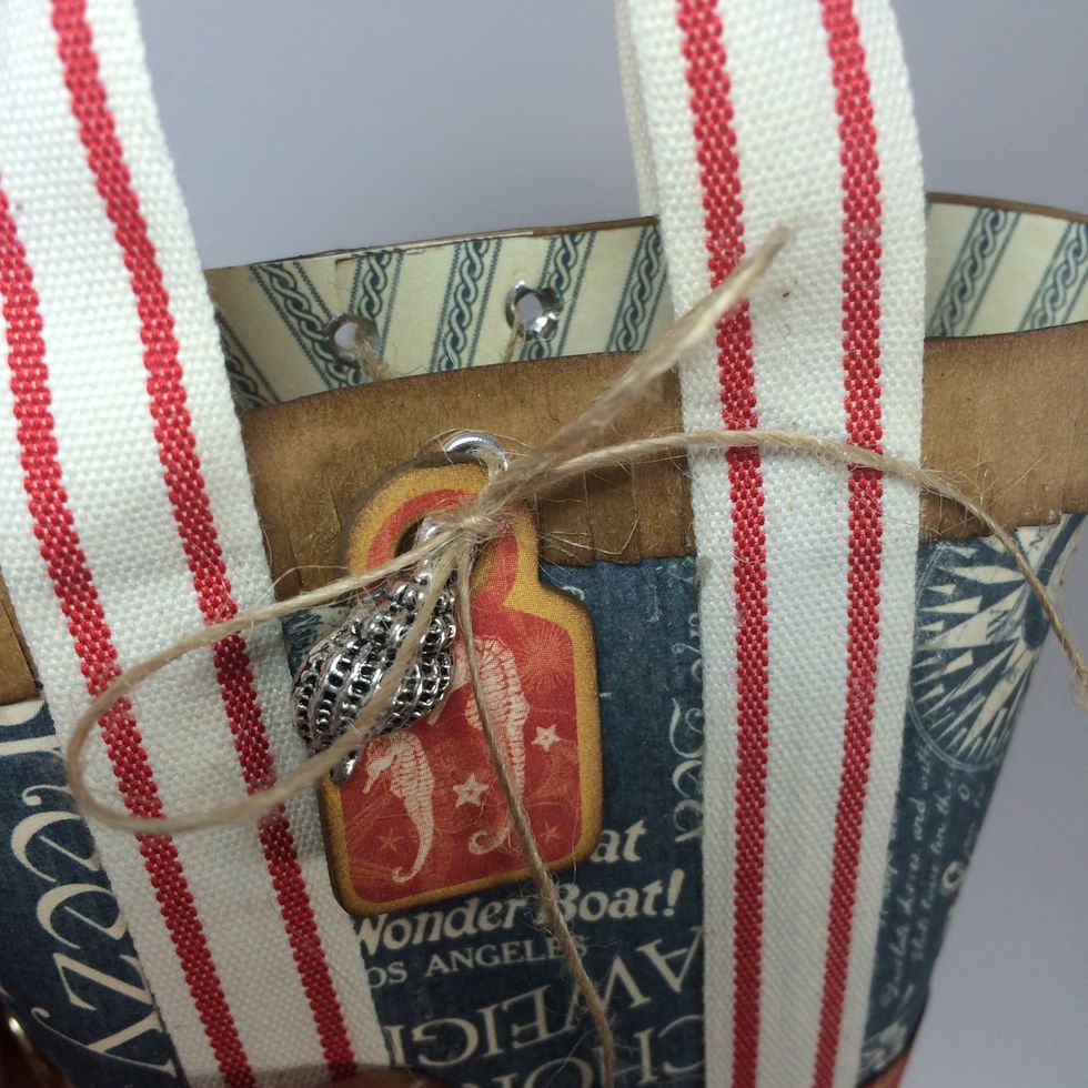 Mix & match chipboard, charms and pattern papers when making your totes.