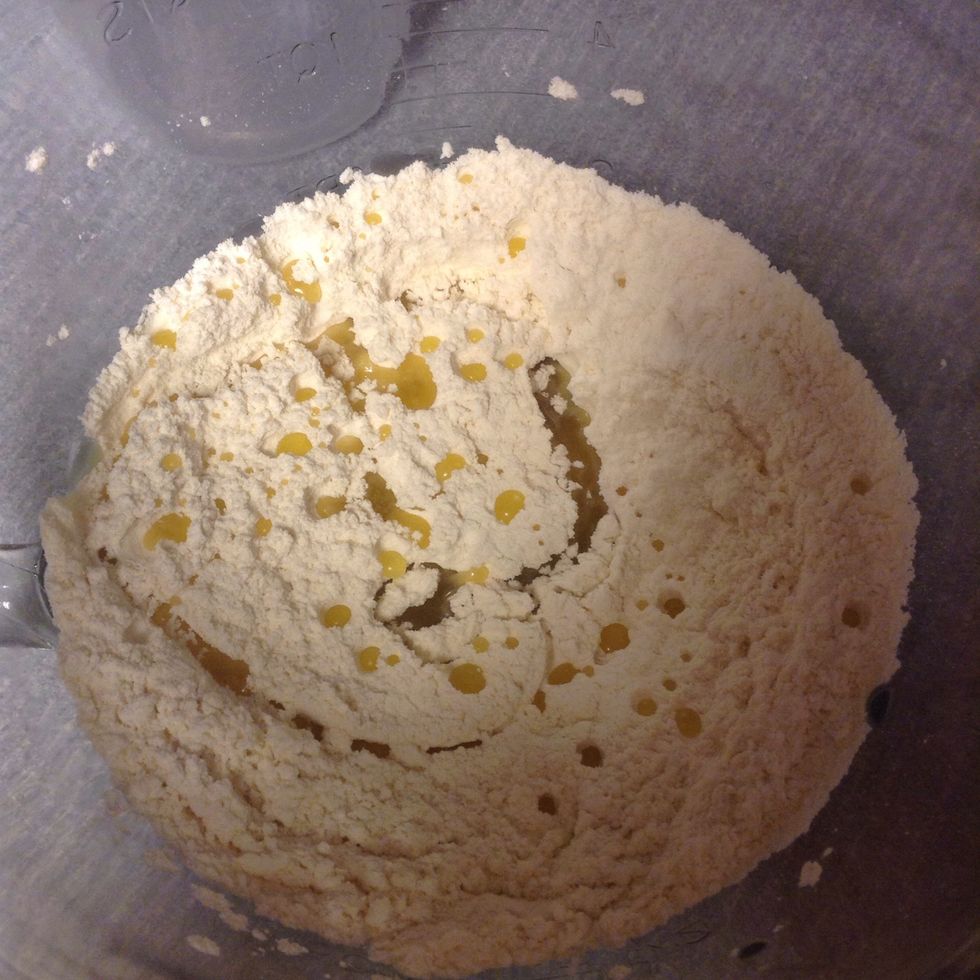 Mix melted ghee, semolina and flour.