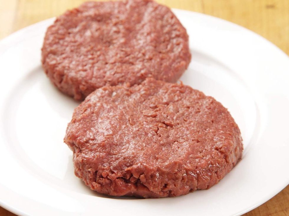 Mix mince, breadcrumbs and grated cheese. Season well. Using hands, shape into 4 patties.