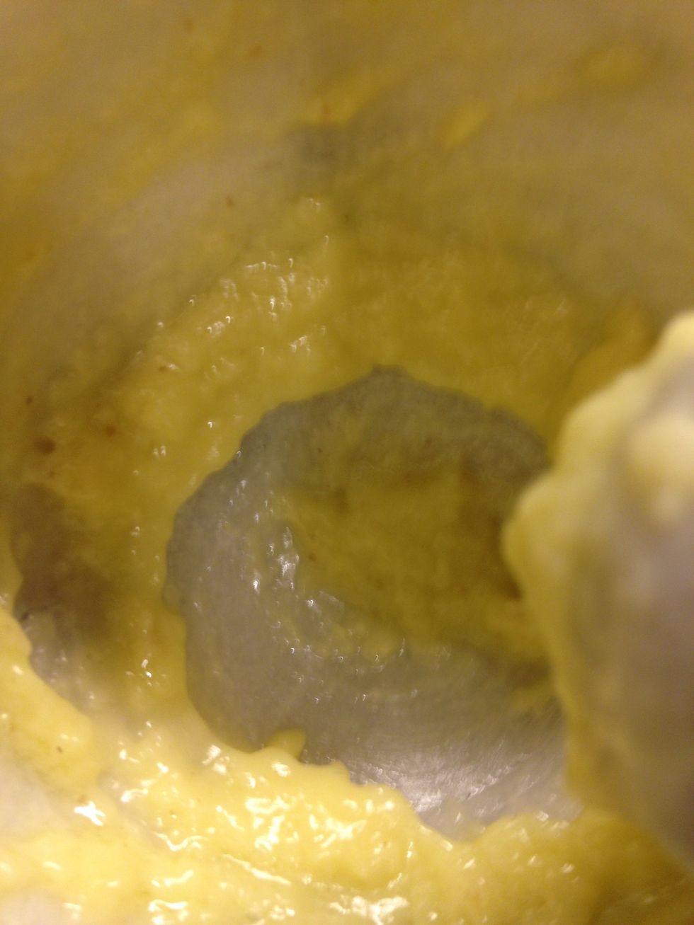 Mix mix mix. Slowly adding the olive oil. Starts to emulsify. Don't put too much or it will break.