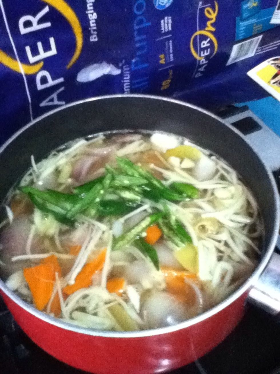 Mix mix mix. Then add the bird eye chillies into the soup. In Malaysia, it's known as Cili Padi. Extremely hot. ( I really love spicy food so depends on you on the amount you want to use)