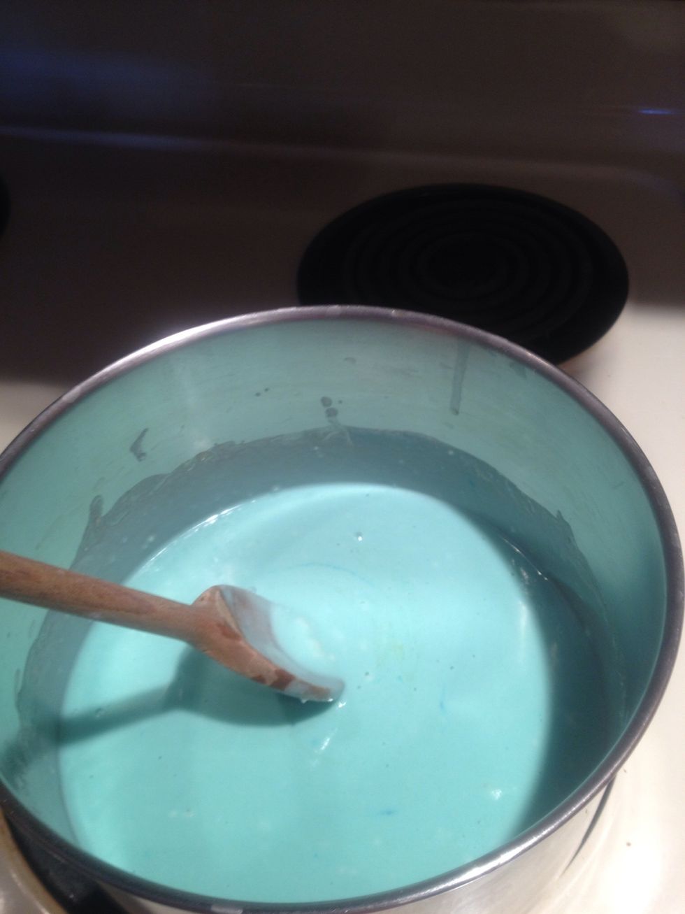 Mix on the stove for 4 to 5 minutes. It may seem like the liquid will never turn into play dough but don't give up it eventually will.