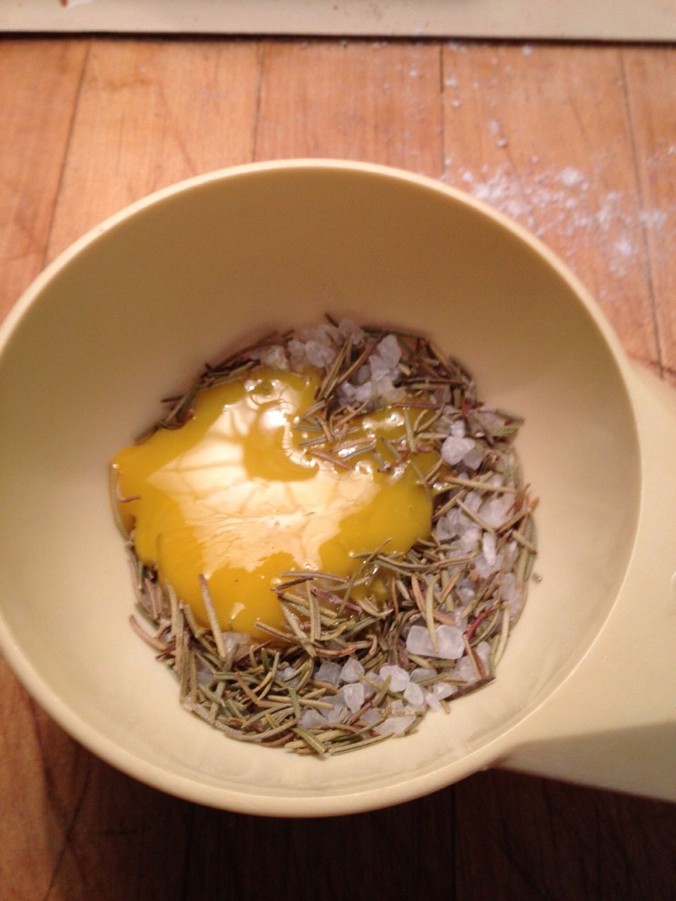 Mix one yolk and the rest of the rosemary and sea-salt, apply to the top of the bread. Bake for 40 minutes, put a lid on the Dutch oven for the first 15 minutes.